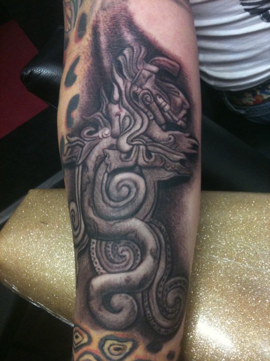 Erik Gutierrez owner of Hollywood Stars Tattoo mayan god tattoo