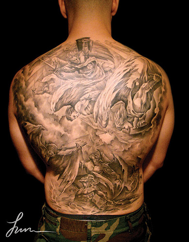 full back tattoo of angels and devils fighting jun tattoos